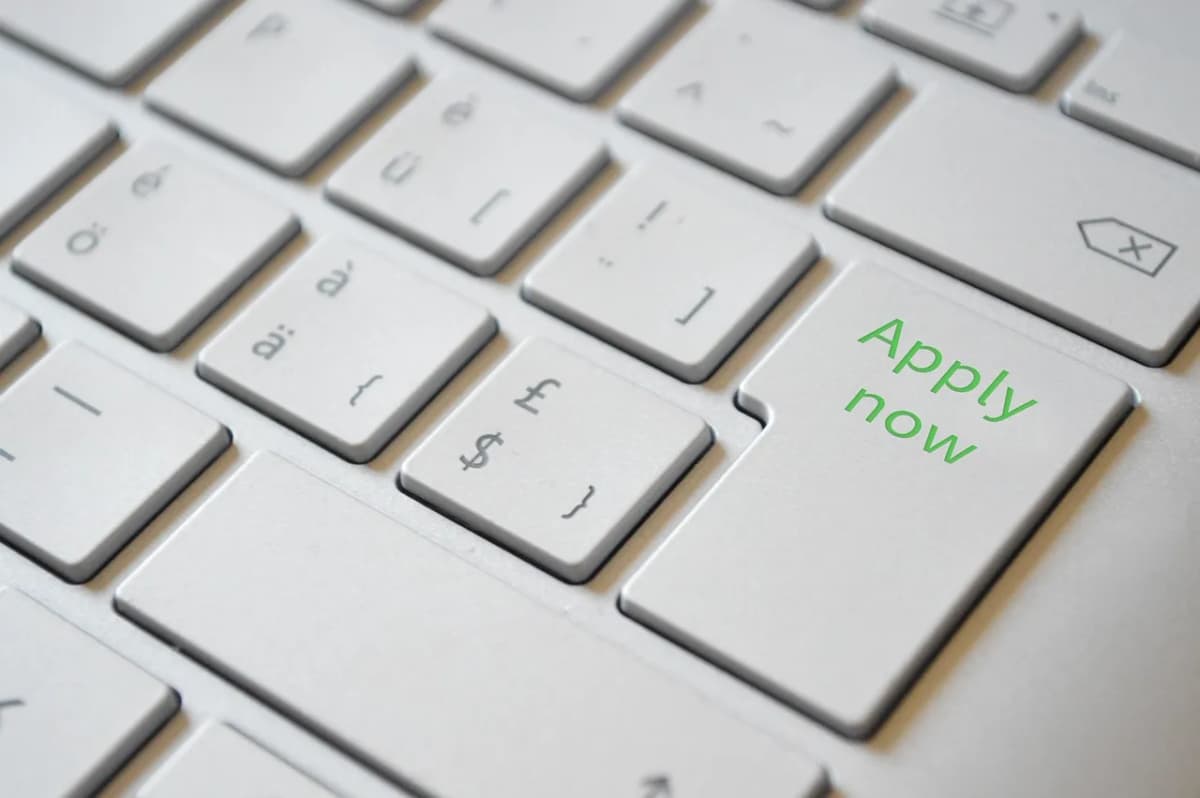 A keyboard with an Apply Now key, as US job openings held at 7.1 million in August