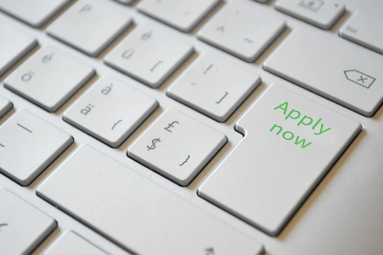 A keyboard with an Apply Now key, as US job openings held at 7.1 million in August
