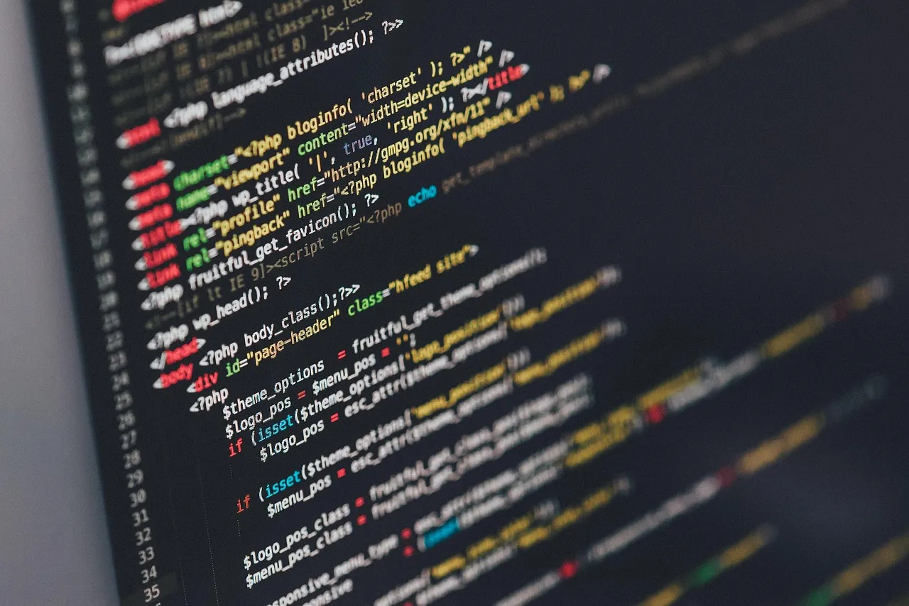 Close-up of colorful PHP code on a dark editor screen